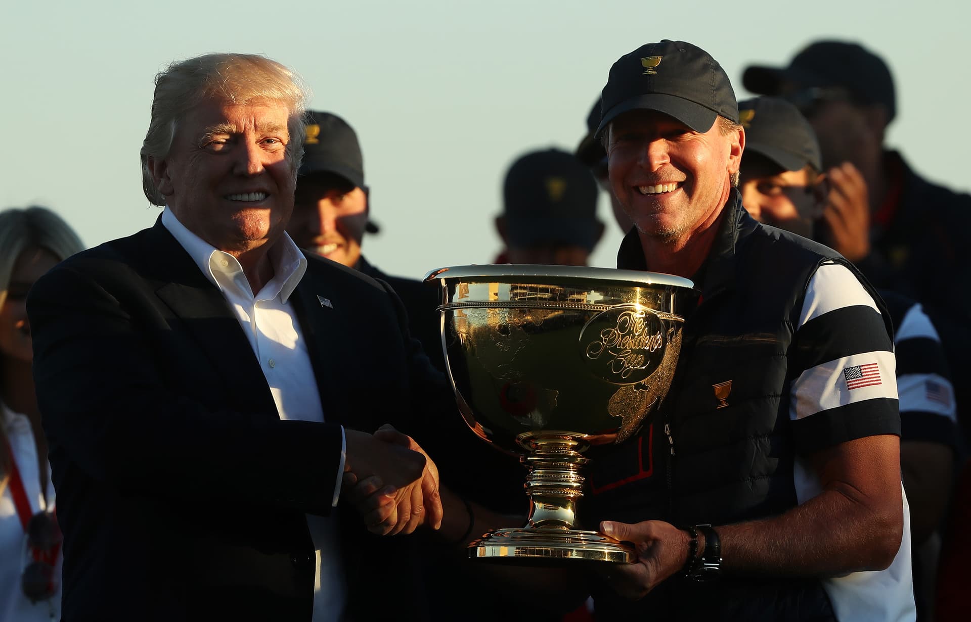 Sam Greenwood/Getty Images President Trump presents Captain Steve Stricker and the U.S. team with the trophy after they defeated the international team 19 to 11 in the Presidents Cup at Liberty National Golf Club on October 1, 2017, at Jersey City, New Jersey.