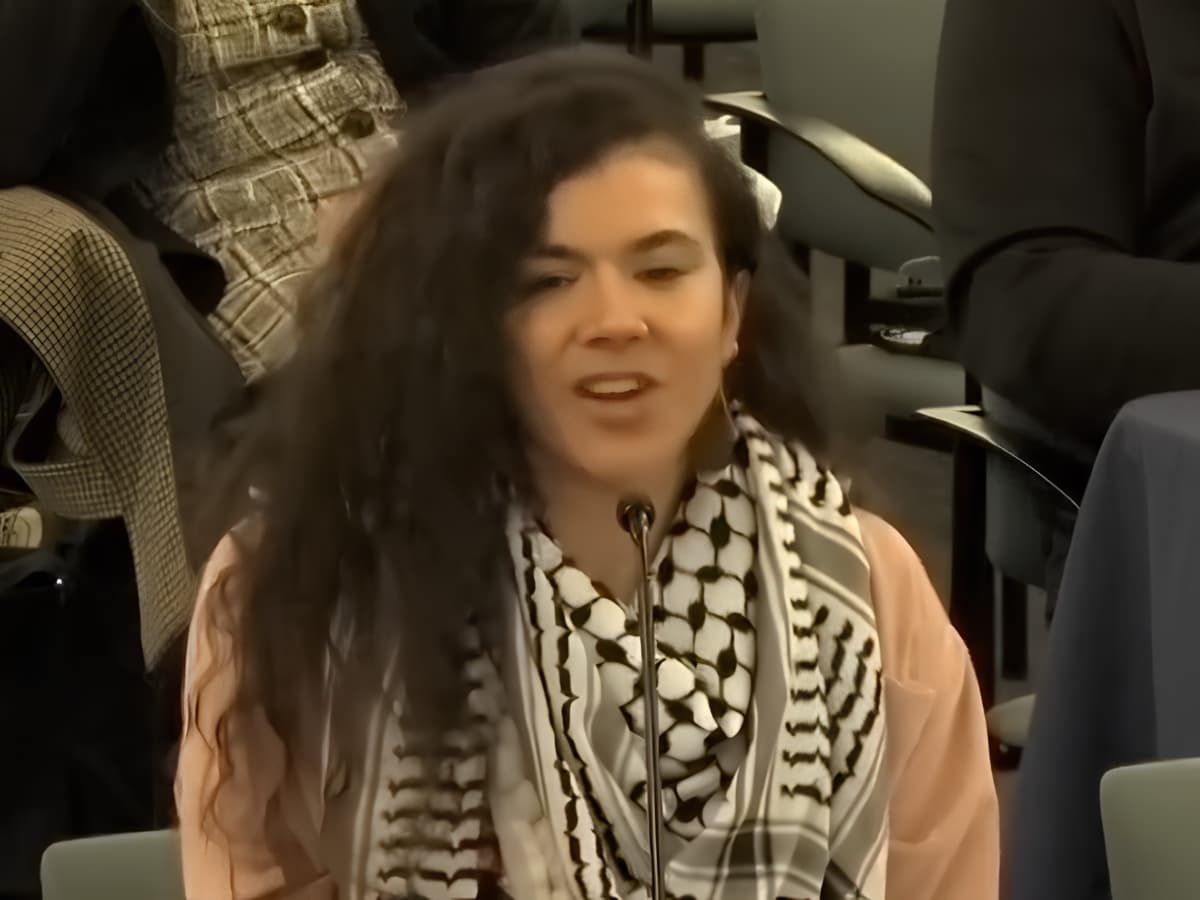 Hannah Gann via Instagram In this screenshot, outed race faker Hannah Gann is seen speaking in December 2025 at a school board meeting on behalf of a Philadelphia teacher, Kezia Ridgeway, who was disciplined for pro-Palestinian posts on her private social media.