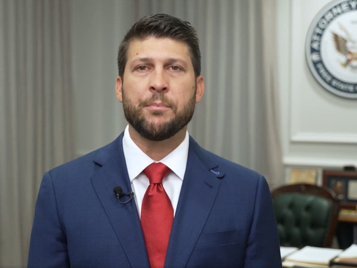 James Uthmeier via X. Florida's attorney general, James Uthmeier, announces a lawsuit asking the court for a temporary injunction to block new AI model development, citing potential harms to children.