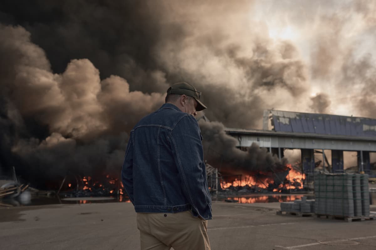 Kostiantyn Liberov/Libkos/Getty Images Smoke rises from a fire at a warehouse after a Russian airstrike at the Bucha district outside Kyiv on August 29, 2026.