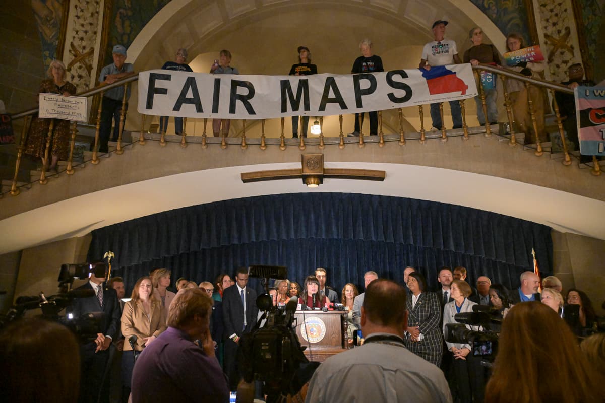 Michael Thomas/Getty Images
Activists display signs inside the rotunda of the State Capitol Building at Jefferson City, Missouri, on September 10, 2025.