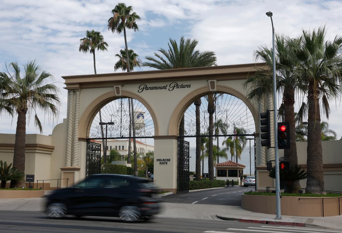 Justin Sullivan/Getty Images A car drives by the main gate at the Paramount Studios lot at Los Angeles, California, on July 13, 2026.