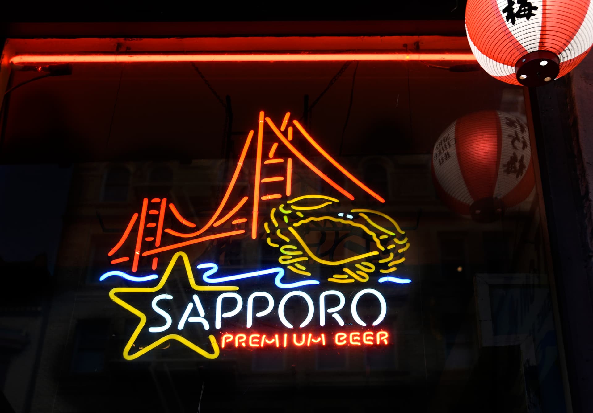 Robert Alexander/Getty Images A neon sign advertising Sapporo beer burns in the window of a Japanese restaurant at San Francisco, California, on September 11, 2018.