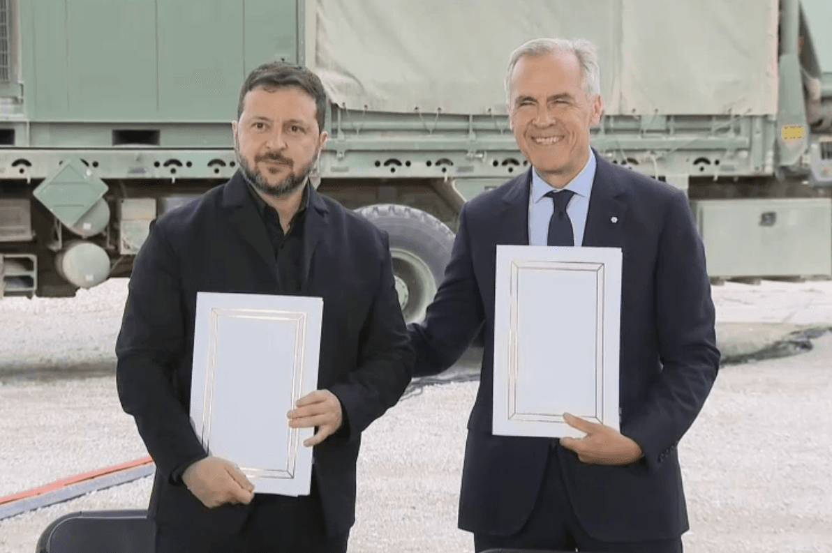 Pool via X Prime Minister Mark Carney and President Volodymyr Zelensky hold up copies of a Canada-Ukraine 100-Year Partnership Declaration signed at Calgary, Alberta, on September 10, 2026.
