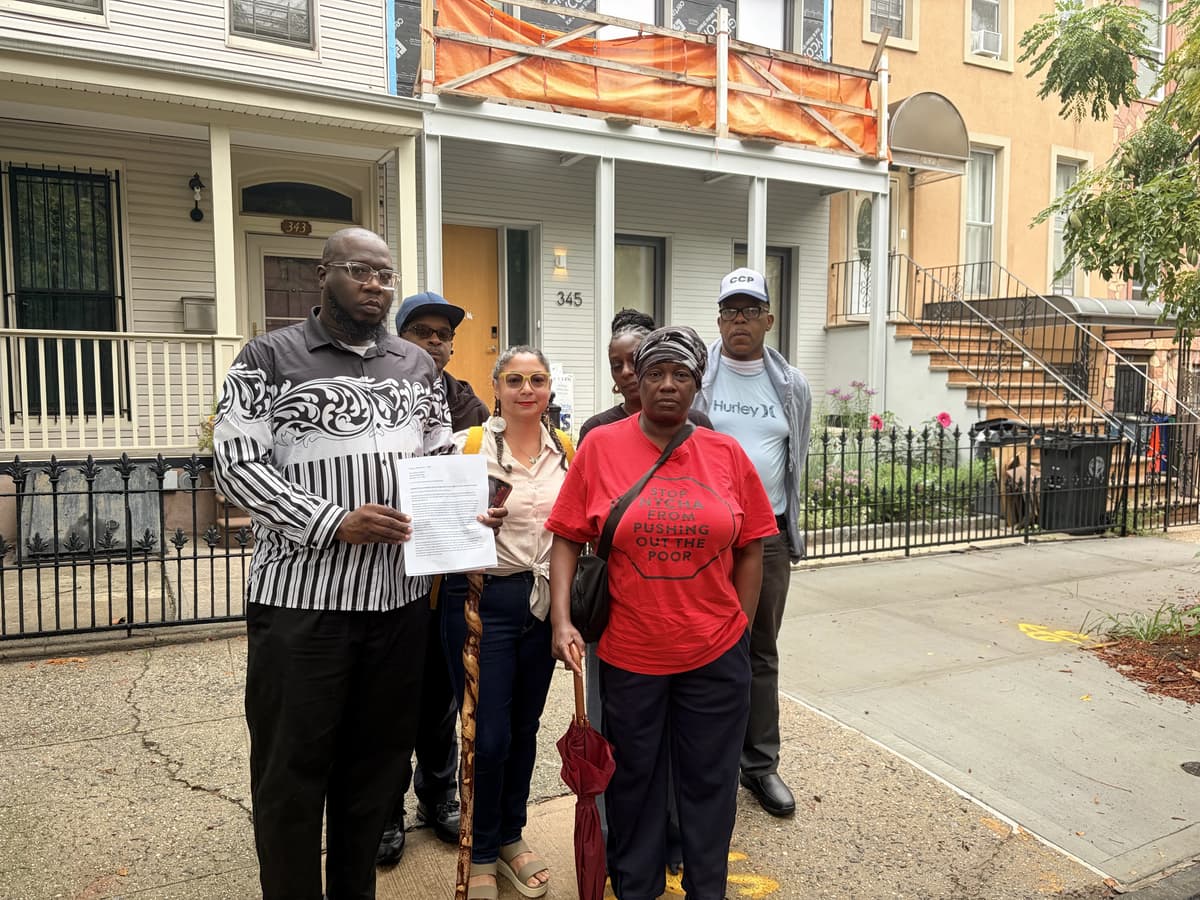 Jennifer Doherty/The New York Sun Activist Reverend Kevin McCall and tenant advocates assembled outside Gustavo Gordillo’s townhouse in Brooklyn’s rapidly gentrifying Bed-Stuy neighborhood.