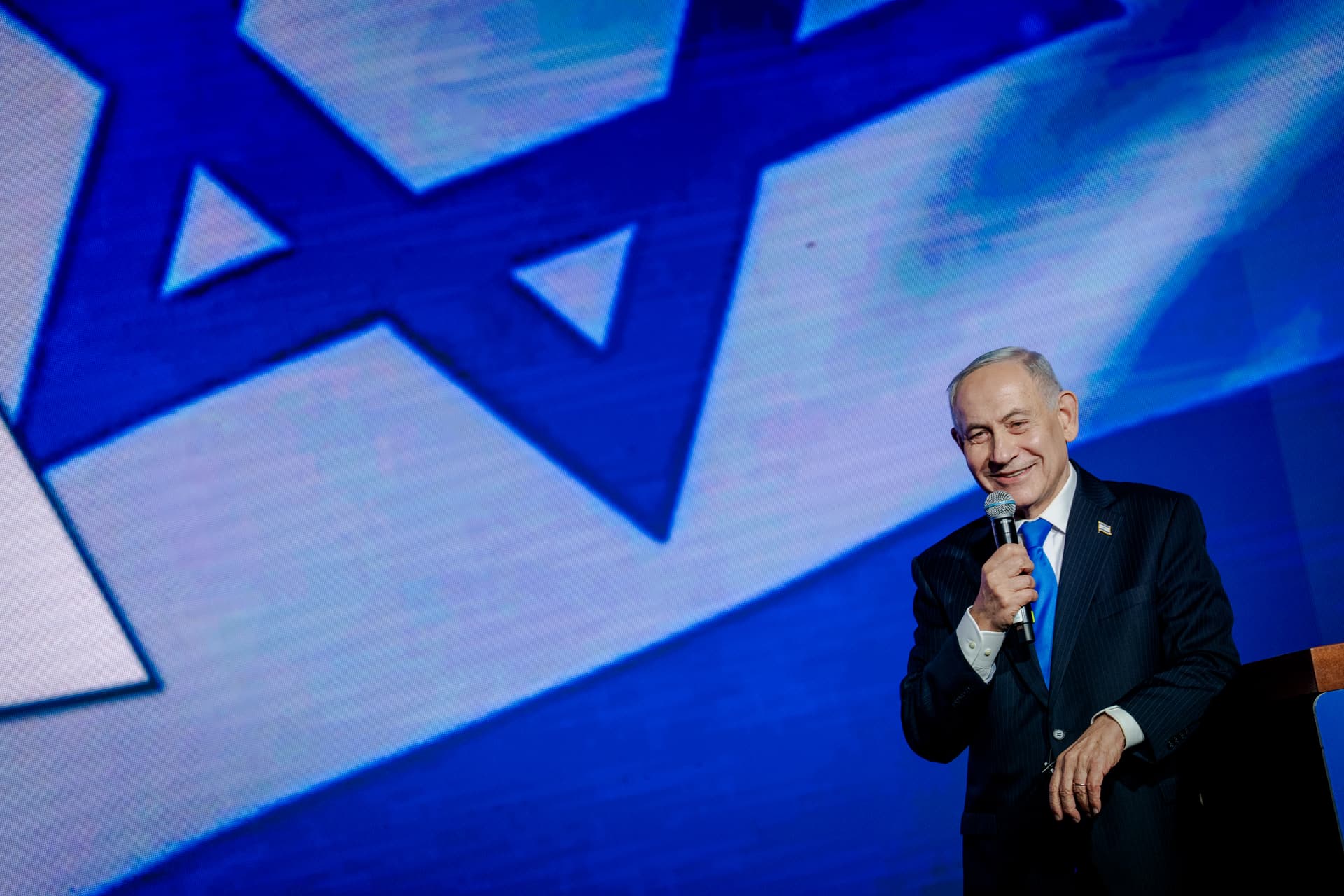 Erik Marmor/Getty Images Benjamin Netanyahu speaks to supporters at the lectern during a party campaign rally at Expo Tel Aviv on September 17, 2026.