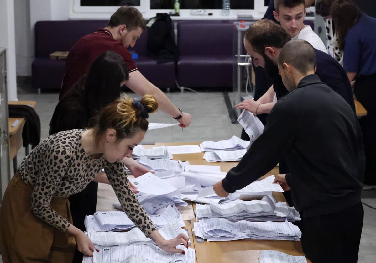 Getty Images Election commission members count ballots on September 20, 2026 from parliamentary elections at a Moscow polling station.