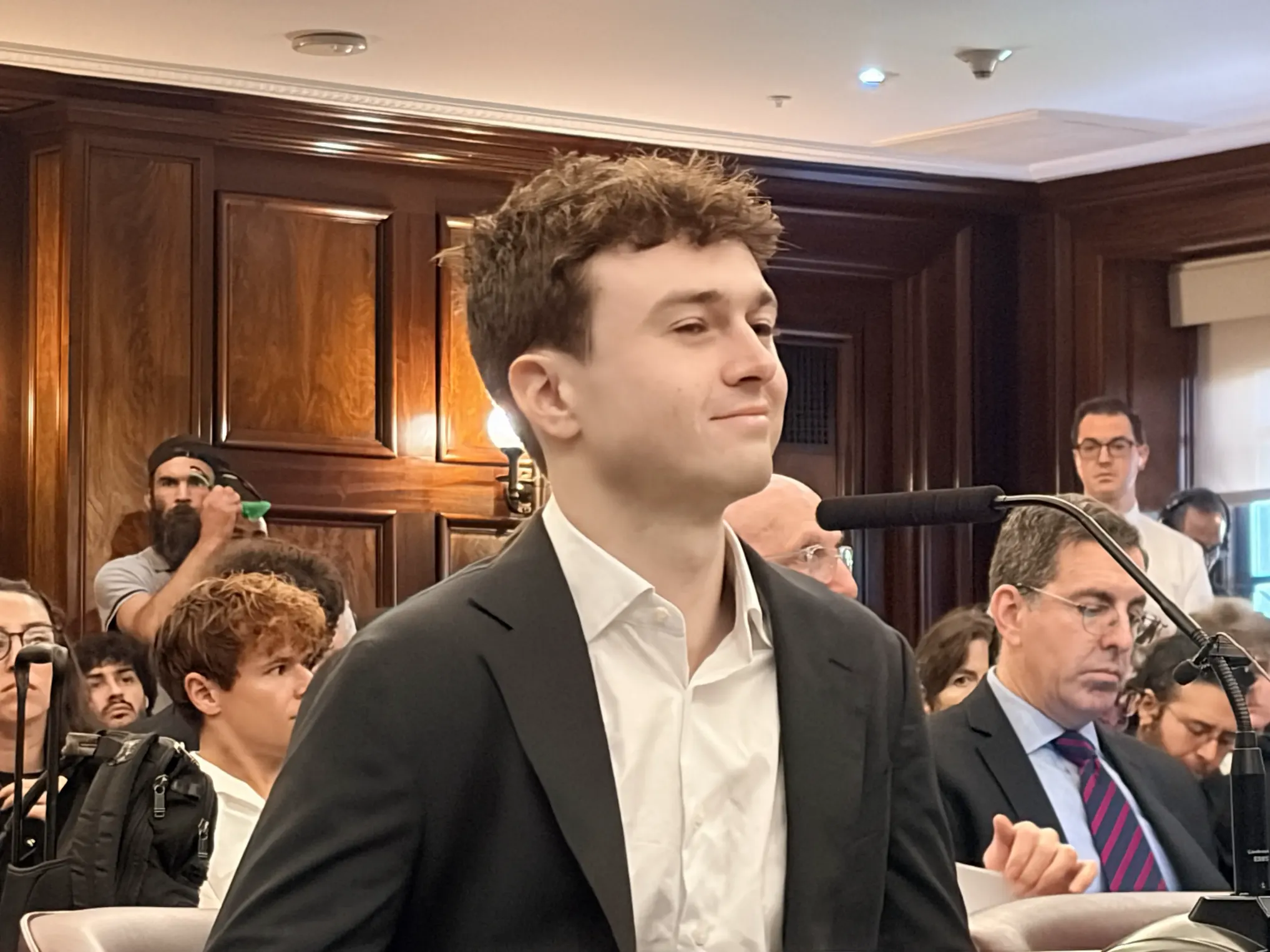 Jennifer Doherty/The New York Sun Former OpenAI and Anthropic researcher Jacob Coxon told New York City Council it is 'more likely than not that humanity loses control to AI' in his testimony on October 5, 2026.