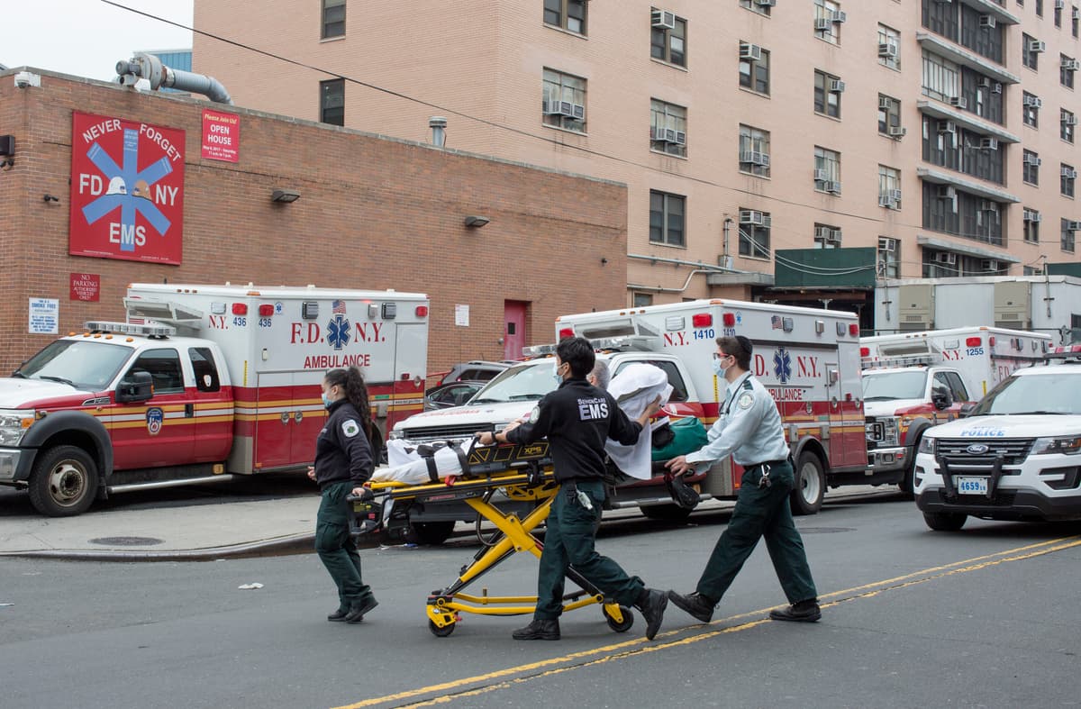 Andrew Lichtenstein/Corbis via Getty Images. Ambulances outside Elmhurst Hospital's trauma unit in Queens, New York.