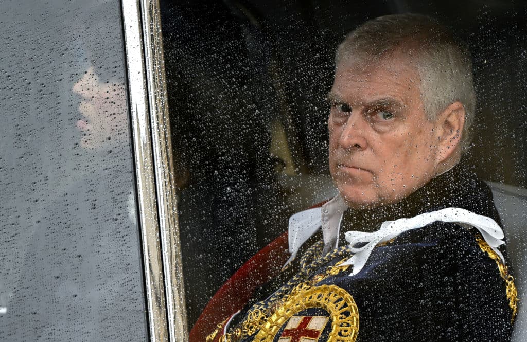 Toby Melville - WPA Pool/Getty Images Andrew Mountbatten-Windsor leaves Westminster Abbey following the coronation ceremony of King Charles III and Queen Camilla on May 6, 2023 at London, England.