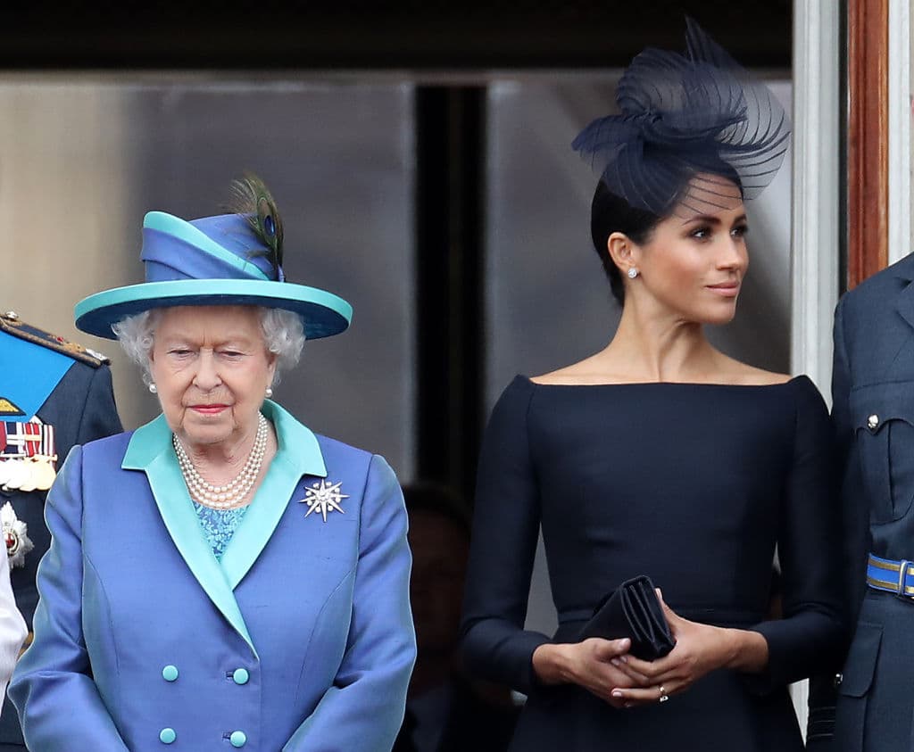 Chris Jackson/Getty Images Queen Elizabeth II and Meghan, Duchess of Sussex on the balcony of Buckingham Palace as the Royal family attend events to mark the Centenary of the RAF on July 10, 2018 at London, England.