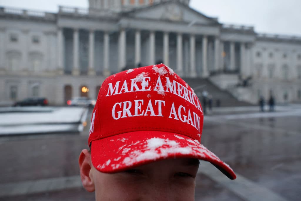 Kevin Dietsch/Getty Images JT Whitaker from Gunnersville, Alabama wears a Make America Great Again hat in the snow on January 19, 2025 at Washington, DC.