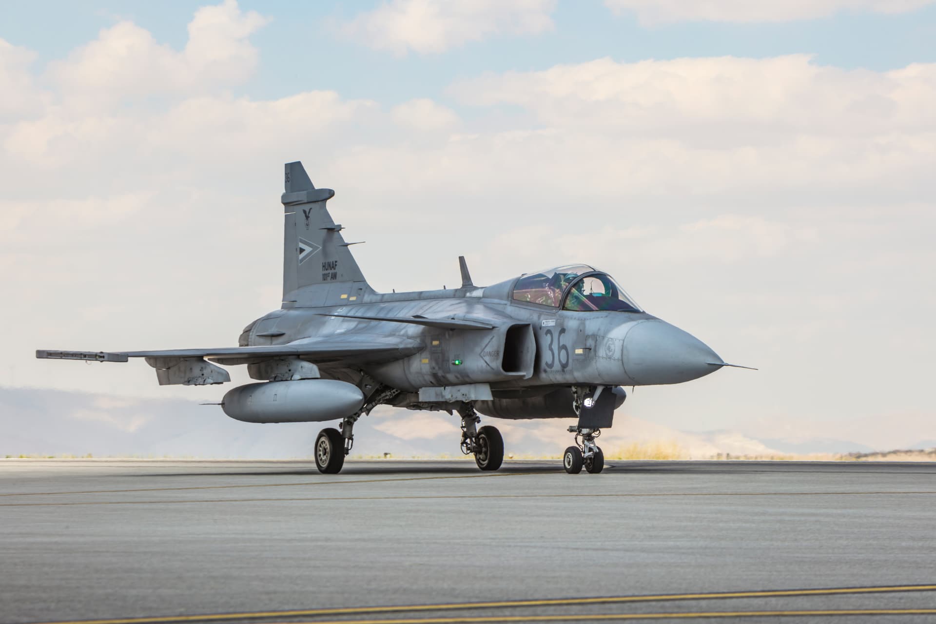 Getty Images A Hungarian Air Force Saab JAS 39 Gripen fighter jet on a runway.