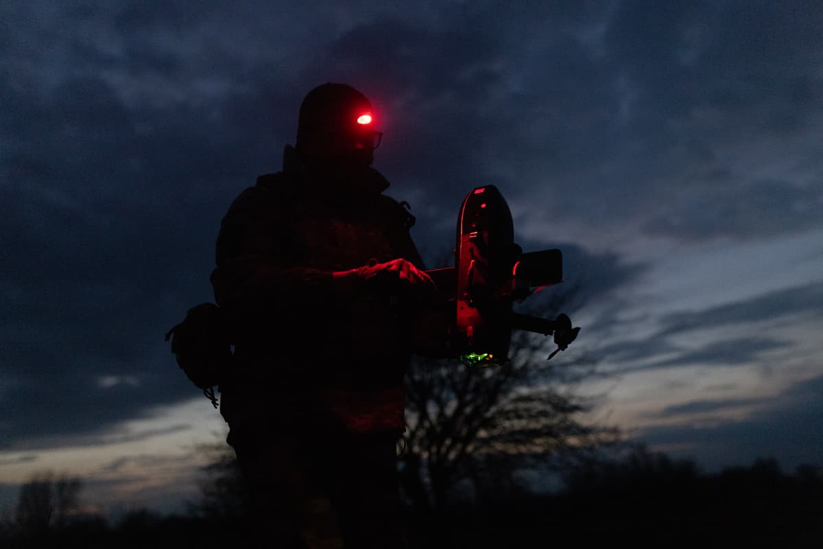 Nikoletta Stoyanova/Getty Images. A soldier of the Unmanned Systems Forces prepares a drone for flight.