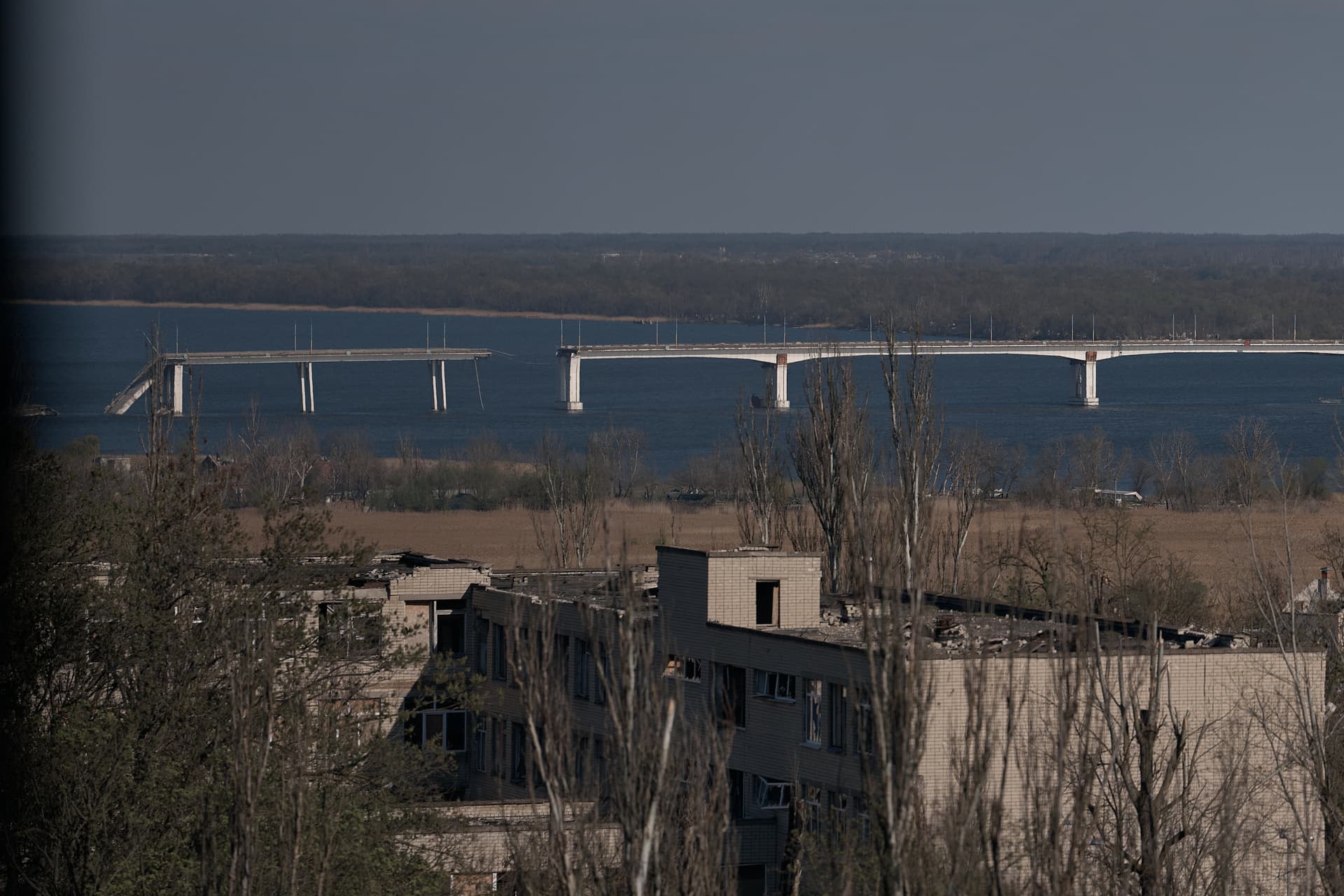 Kostiantyn Liberov/Libkos/Getty Images A view of the destroyed Antonivskyi Bridge spanning the Dnipro River near Kherson, a key crossing that was heavily damaged during the war and remains one of the most recognizable landmarks of the frontline area in southern Ukraine, on April 5, 2026 at Kherson, Ukraine.