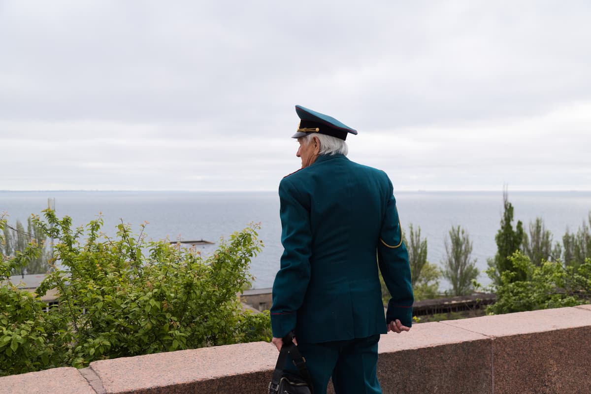 Pierre Crom/Getty Images Viktor, a veteran of the former Soviet Army, watches the Black Sea from the Monument of the Unknown Sailor on May 8, 2026 at Odesa, Ukraine.
