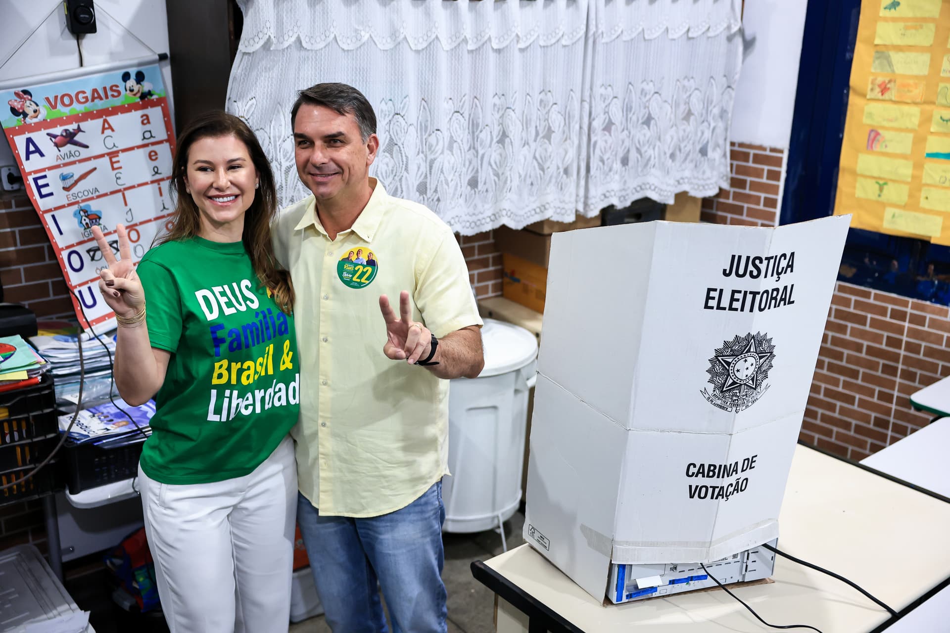 Buda Mendes/Getty Images. Flávio Bolsonaro presidential candidate for he Partido Liberal and his wife, Fernanda Bolsonaro.
