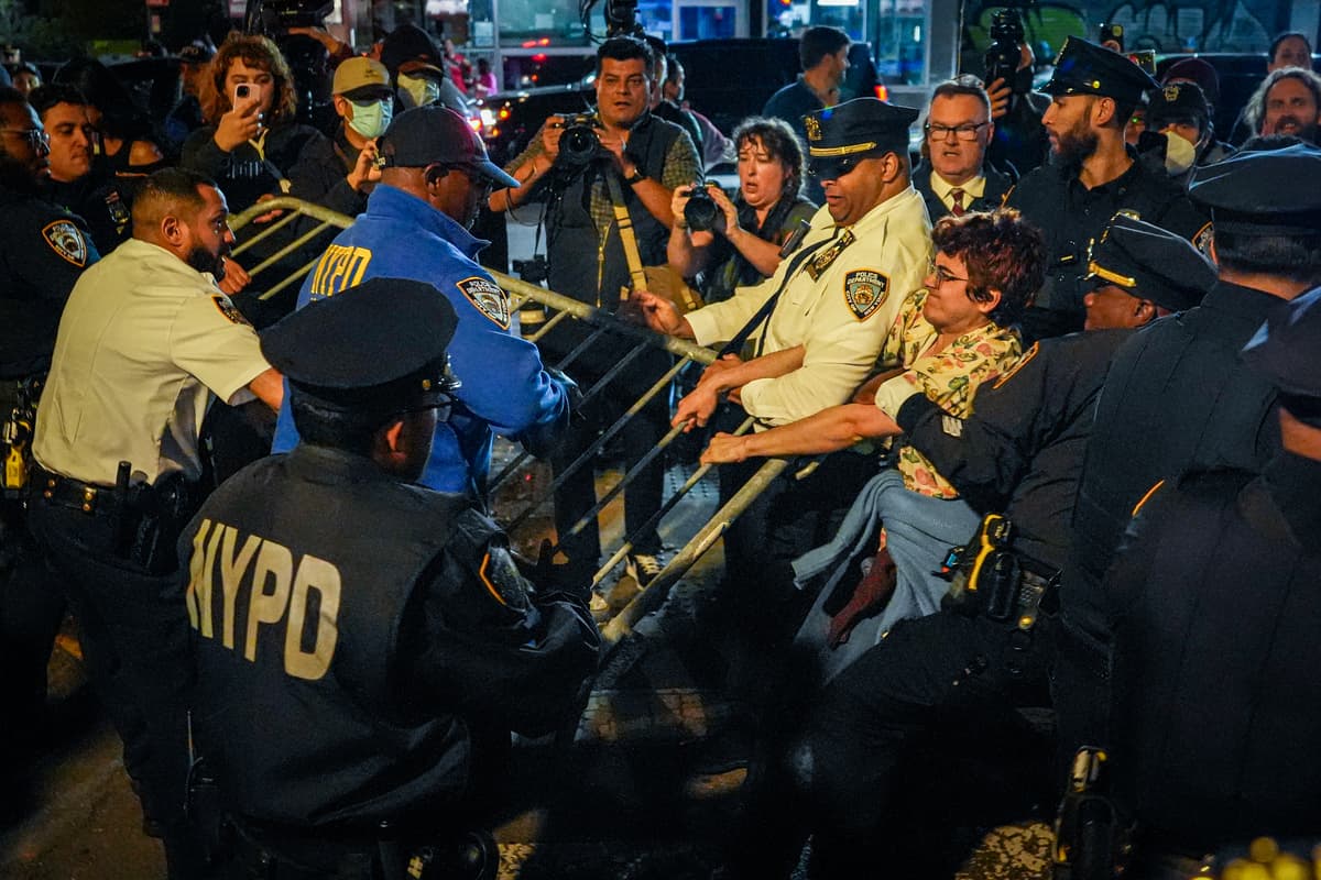 Ryan Murphy/Getty Images. Protesters clash with NYPD officers after a man was shot by an Immigration and Customs Enforcement (ICE) officer during an operation in the Bronx.