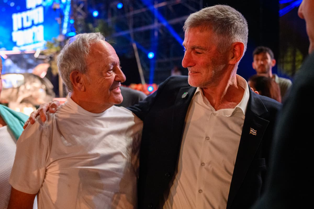 Alexi Rosenfeld/Getty Images Yair Golan speaks with family members at the October 7 Families’ National Memorial Ceremony at Tel Aviv as Israel marks the third anniversary of the attacks.
