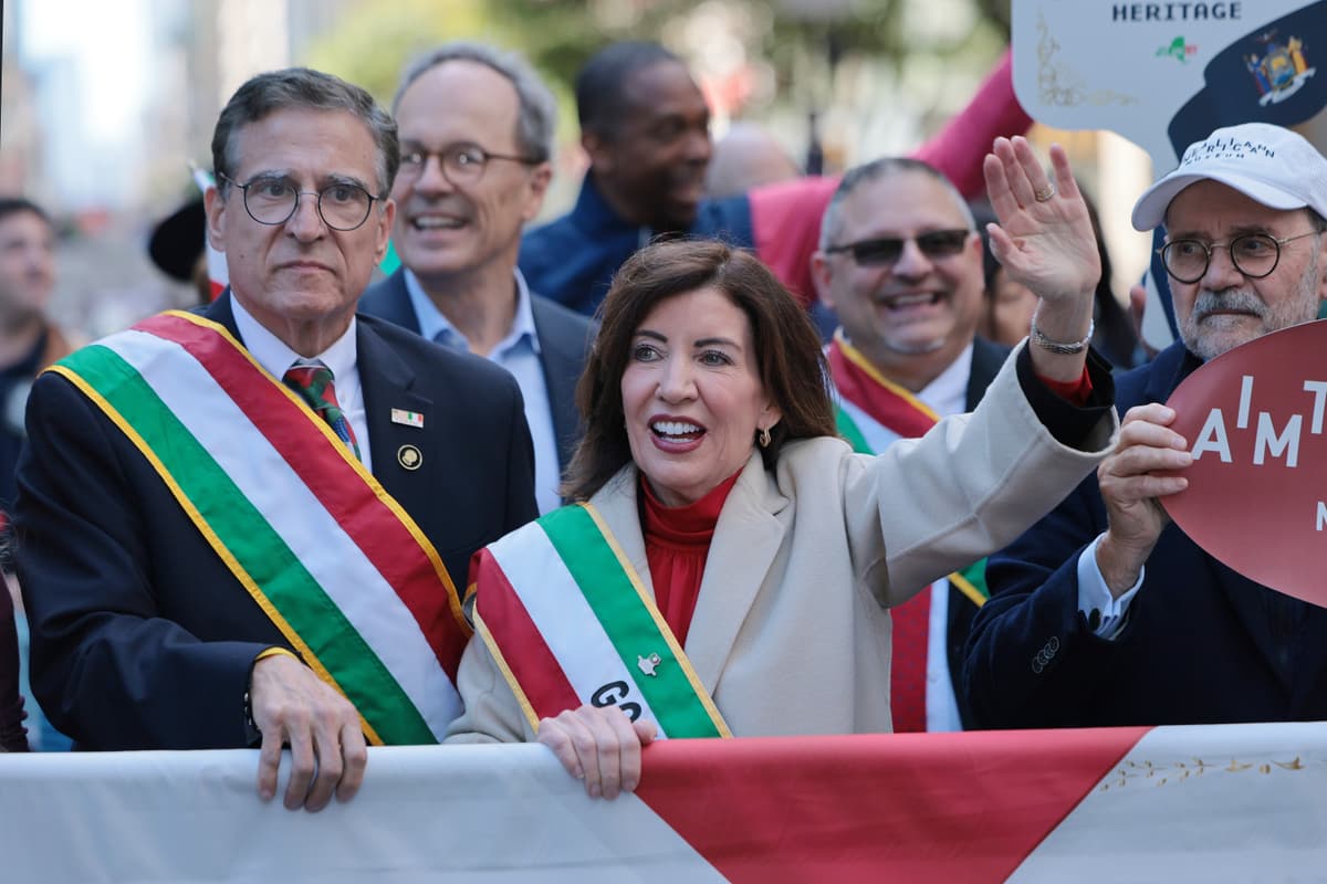 Michael M. Santiago/Getty Images. Gov. Kathy Hochul waves as she participates in the Columbus Day Parade along Fifth Avenue.