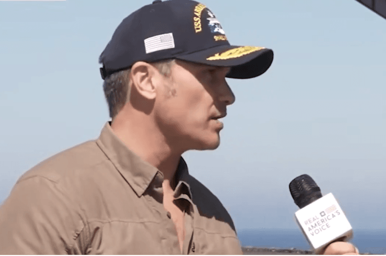 Via X Defense Secretary Pete Hegseth announces plans for the public execution of Nidal Hasan in a screenshot from his interview with Human Events Daily on board the USS Abraham Lincoln.