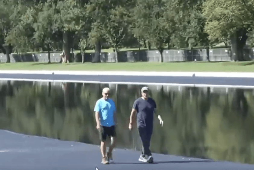 Via X Two visitors walk along the Lincoln Memorial Reflecting Pool as it is being refilled at Washington, D.C., on October 13, 2026.