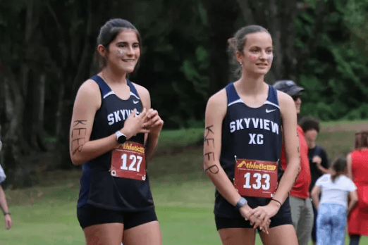 Joel Retzlaff High school runners Charlie Garrett (left) and Sierra Retzlaff pose after dropping out of a cross country race to protest the decision to allow a biological boy to compete in the race.
