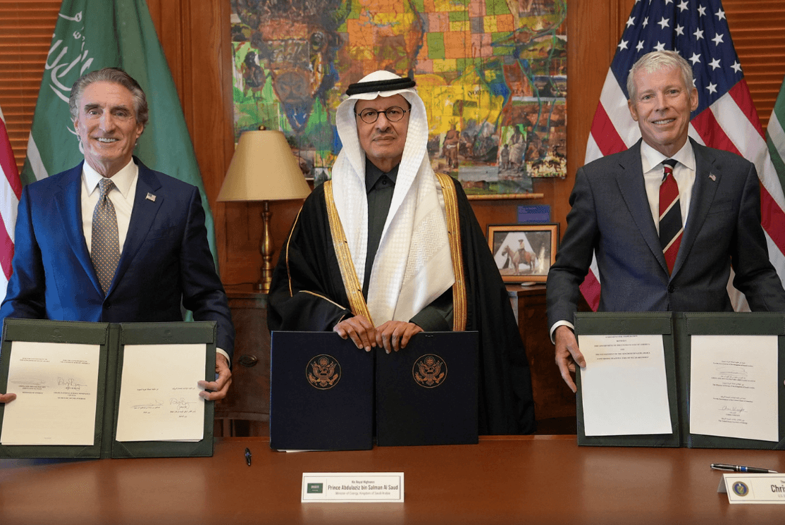 Department of Energy Interior Secretary Doug Burgum, the Saudi energy minister, Prince Abdulaziz bin Salman, and Energy Secretary Chris Wright display copies of their newly signed nuclear energy agreement at Riyadh, Saudi Arabia, on July 22, 2026.