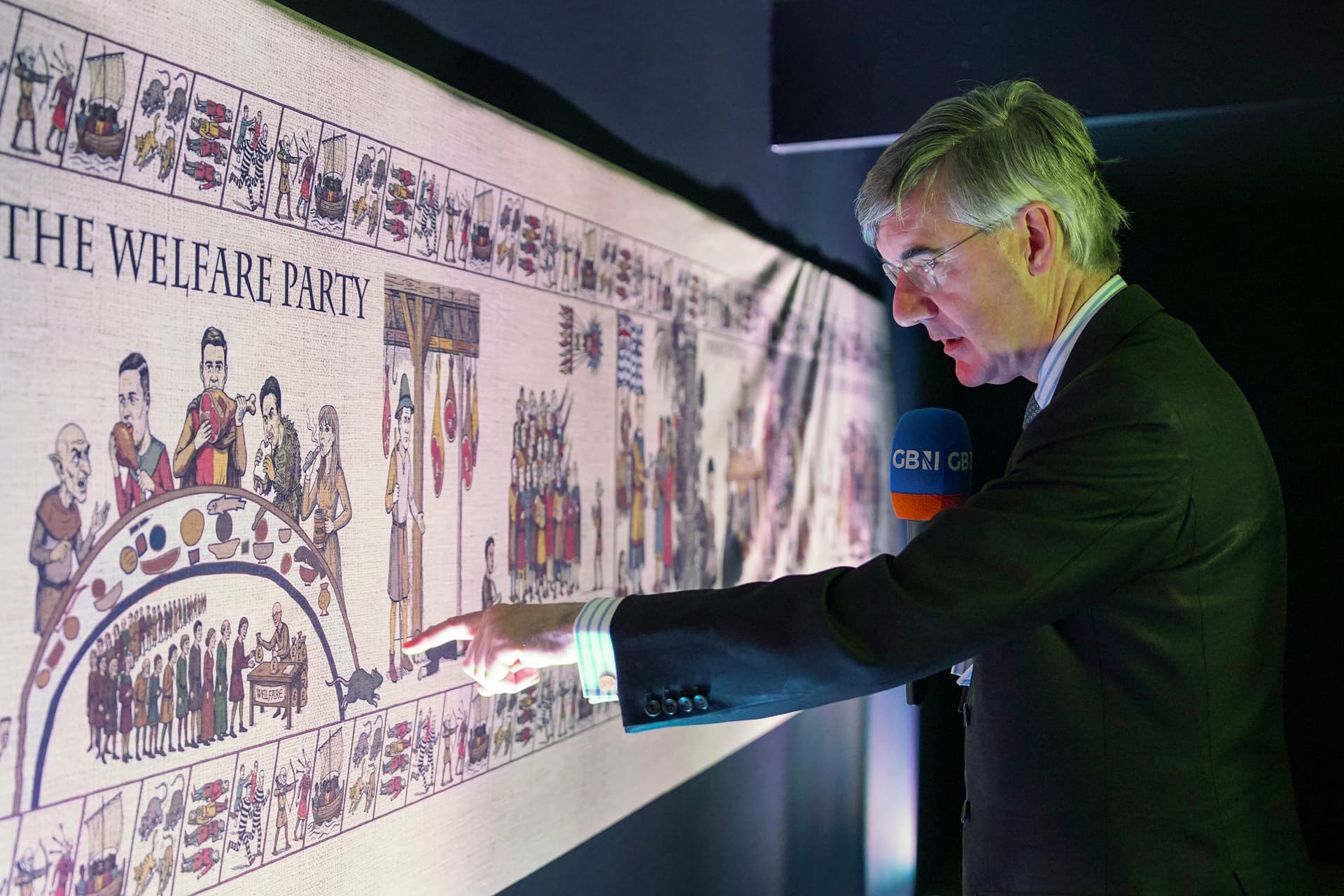 Ian Forsyth/Getty Images A former MP, Jacob Rees-Mogg, tours the Birmingham tapestry on day two of the Conservative Party Conference on October 5, 2026.