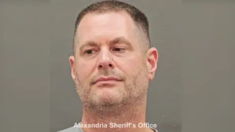 Via Alexandria Sheriff's Office David Rush pleaded guilty Tuesday in the Eastern District of Virginia to a decade long fraud.