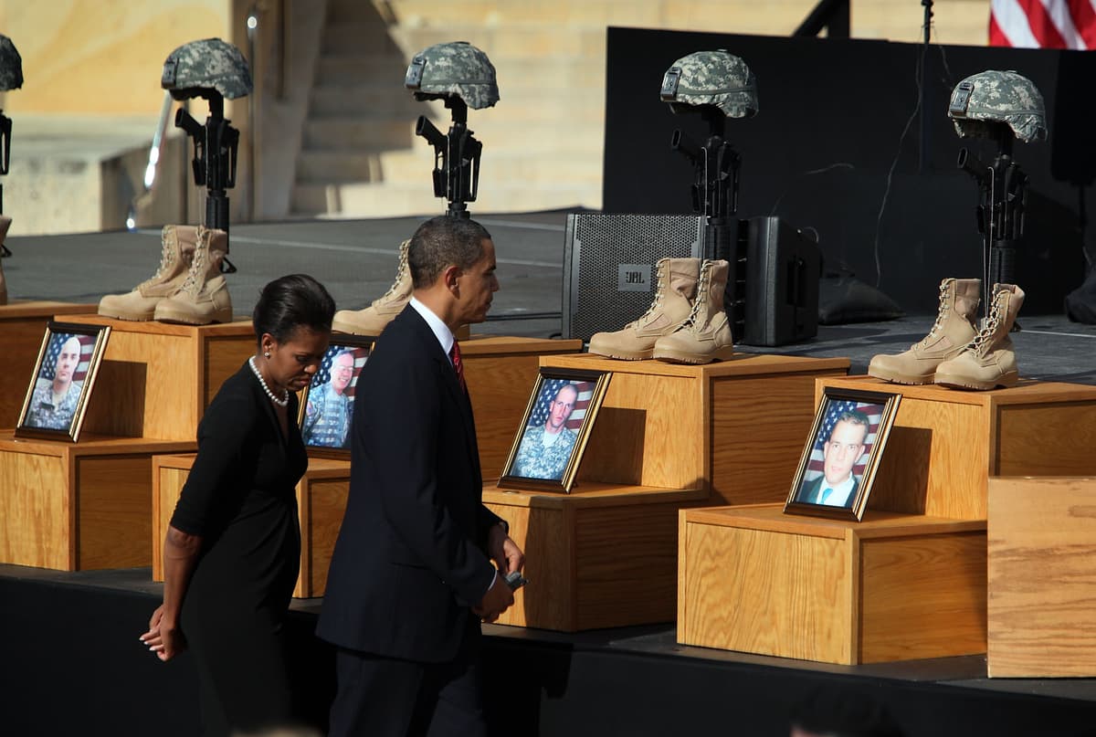 Joe Raedle/Getty Images President Obama and the first lady, Michelle Obama, at a memorial service on November 10, 2009 for victims of Nidal Hasan's shooting rampage at Fort Hood, Texas.