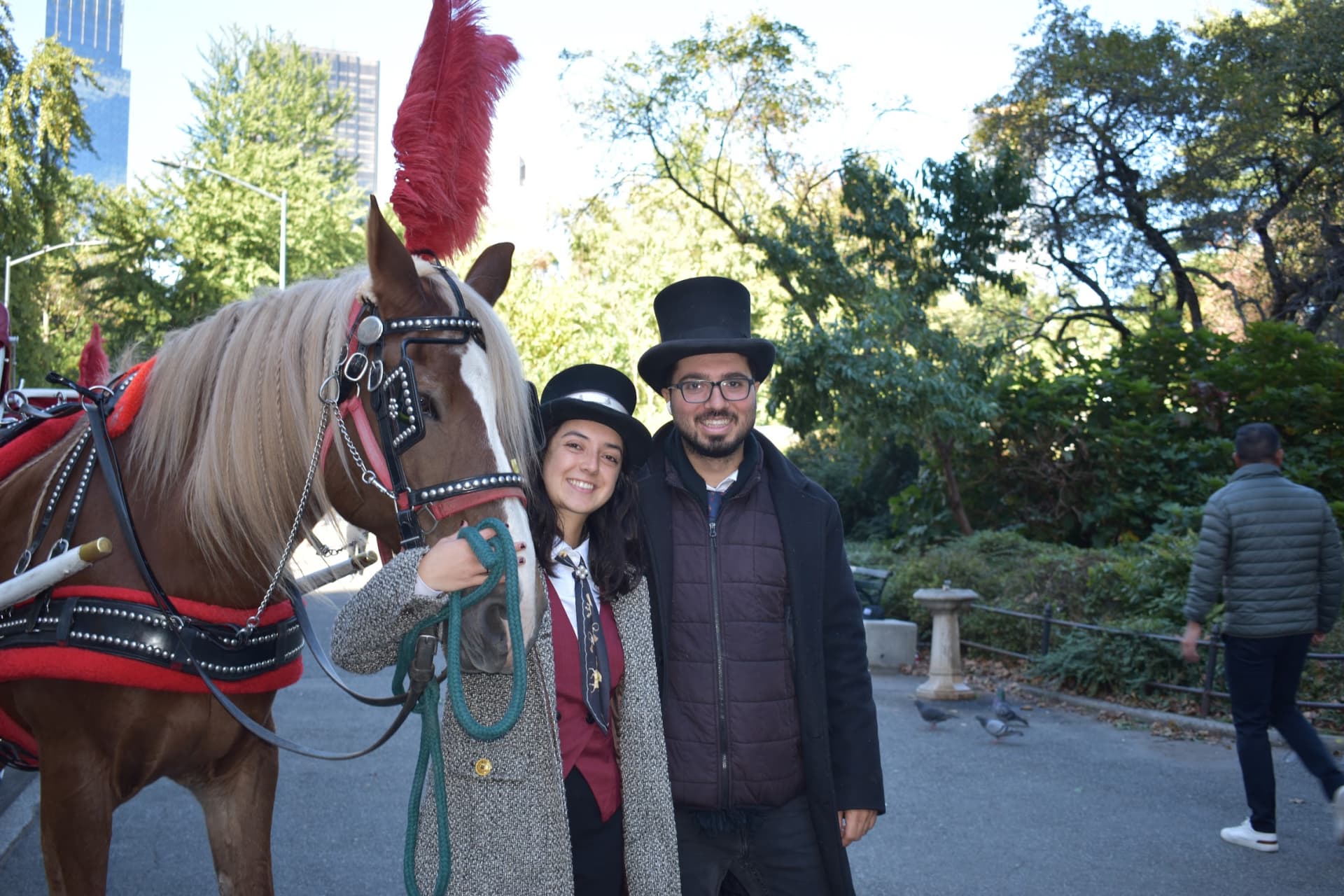 Jennifer Doherty/The New York Sun Married carriage driver couple Yusuf and Letty pose with their horse Willy.